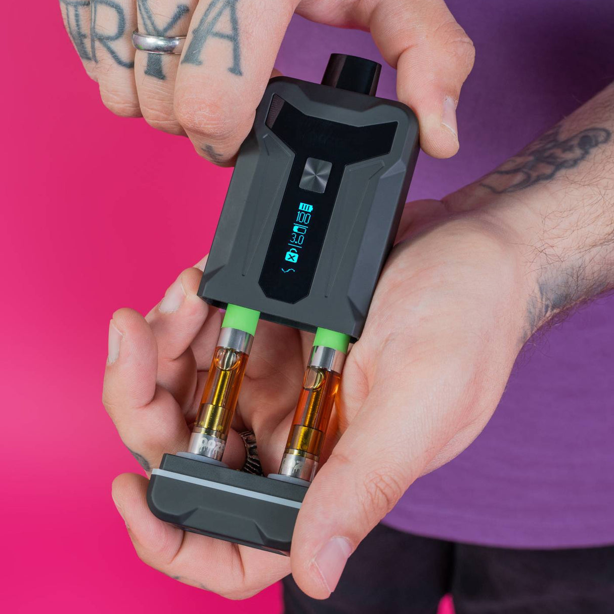 Pulling base out of a black Duet to reveal two attached carts