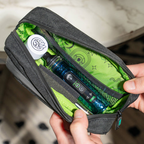 Opening a smell proof travel bag with wax and a Titan inside