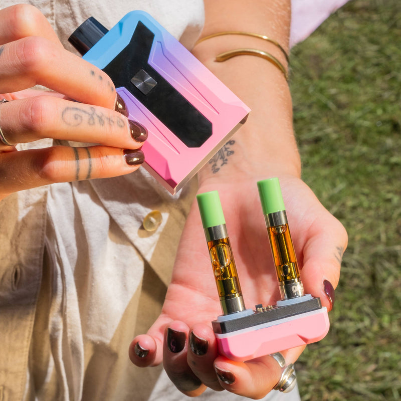 Base pulled out of twilight Duet battery to show two carts attached