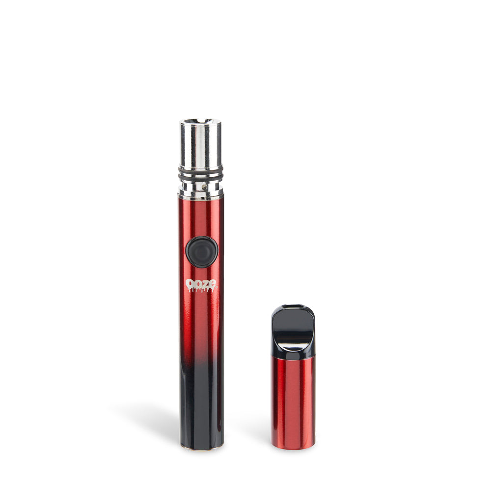 The Midnight Sun Ooze Signal wax pen is standing upright with the mouthpiece sitting next to the base against a white background.
