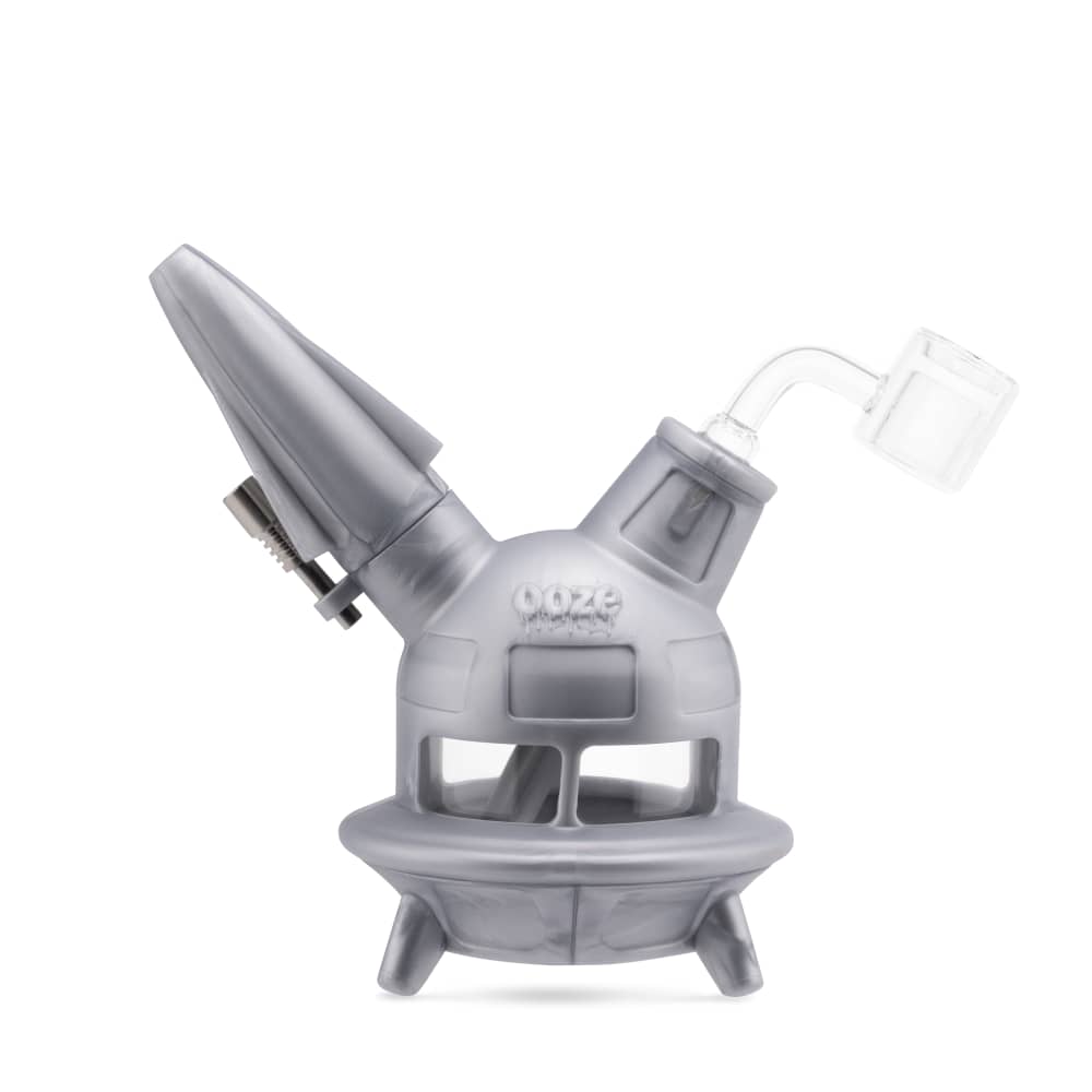 The stellar silver Ooze UFO is shown as a dab rig with the banger inserted