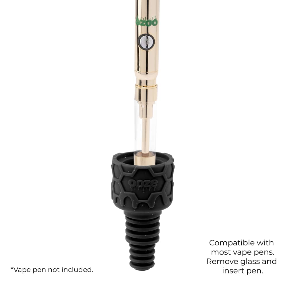 A gold Ooze pen is inserted into the shimmer black Armor bowl to demonstrate the UFO's vape function