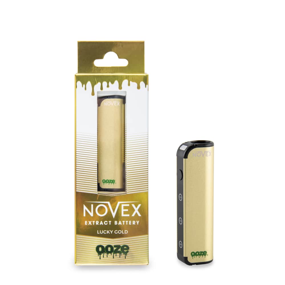 A lucky gold Ooze Novex stands to the right of a gold Novex in a box