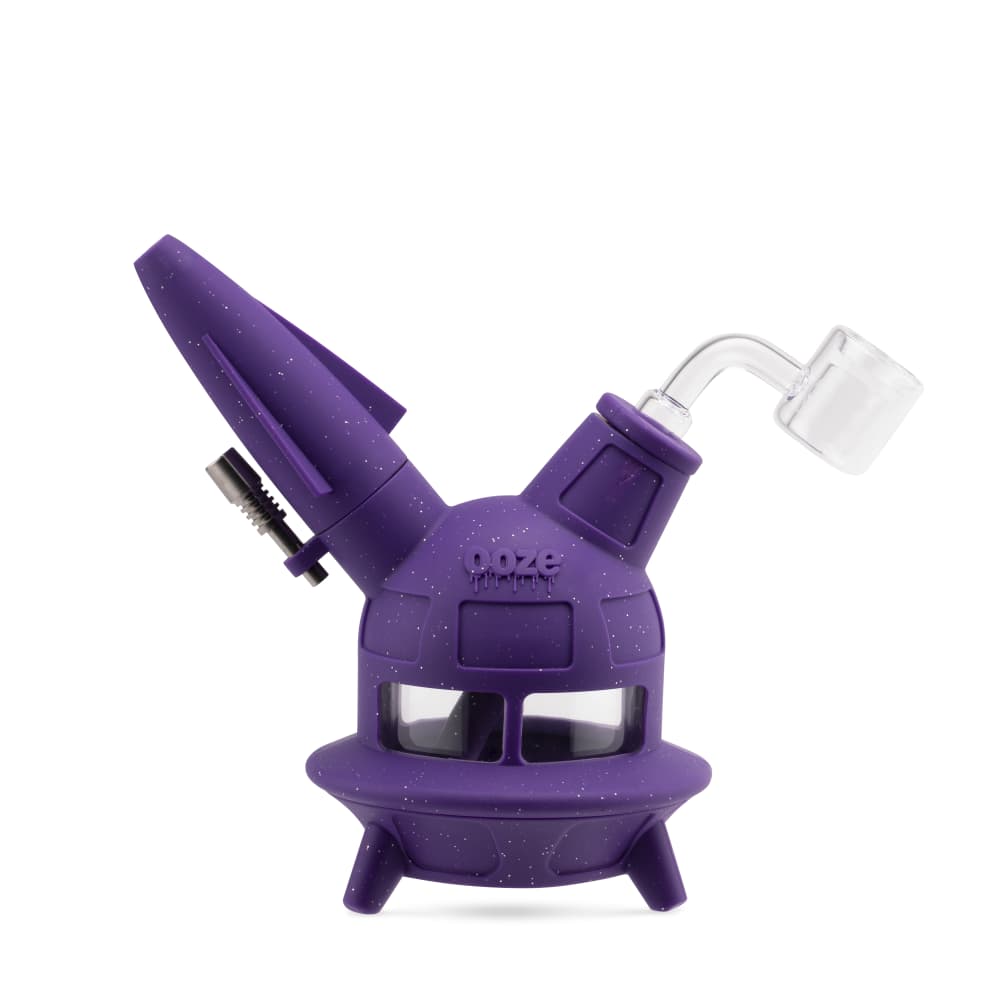The shimmer black Ooze UFO is shown as a dab rig with the banger inserted