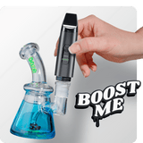 Person attaching the Black Booster extract vape to dab rig
