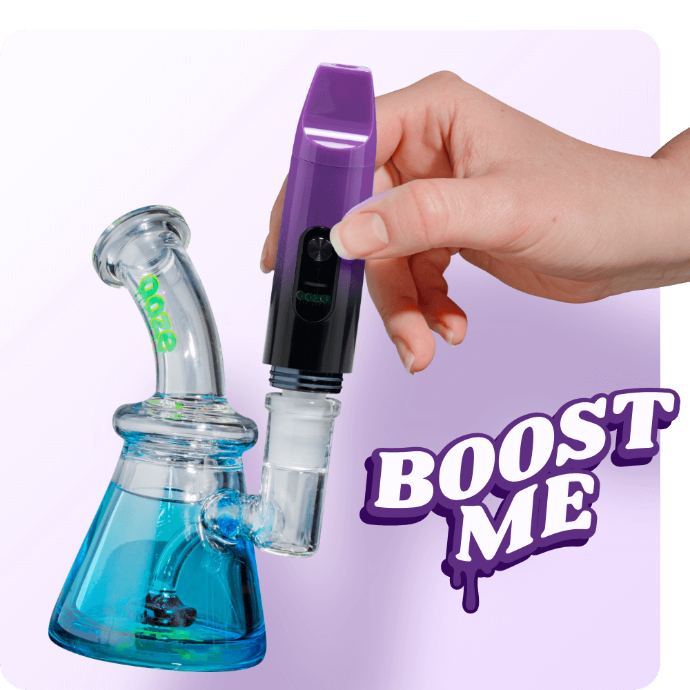 Person attaching the Purple Booster extract vape to dab rig
