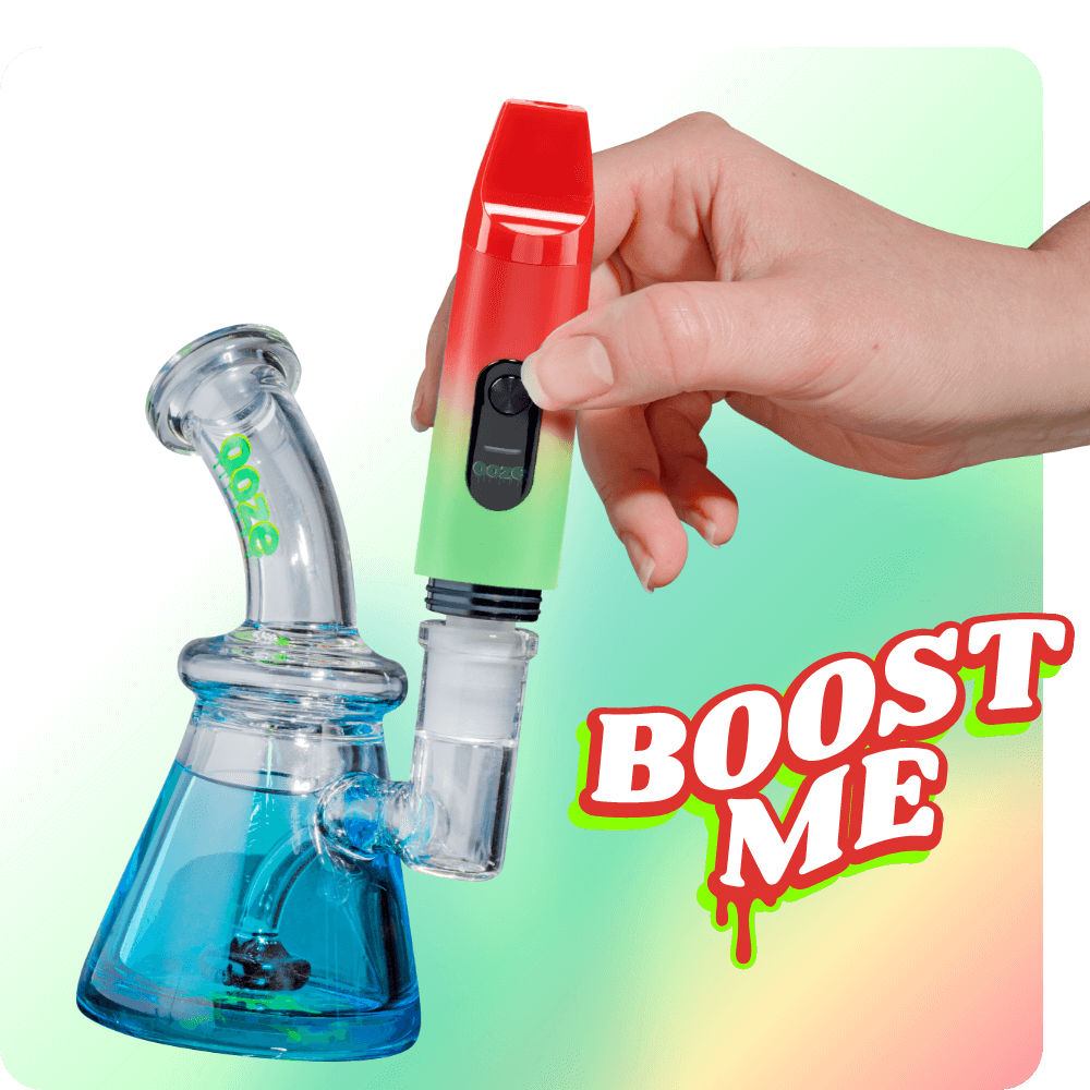 Person attaching the Rasta Booster extract vape to dab rig
