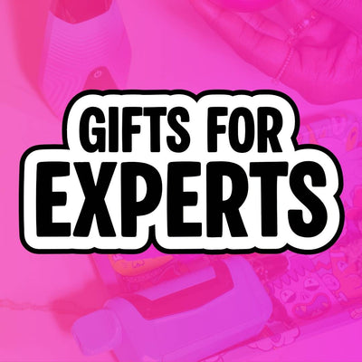 Text 'Gifts for Experts' on a pink background with blurred objects.