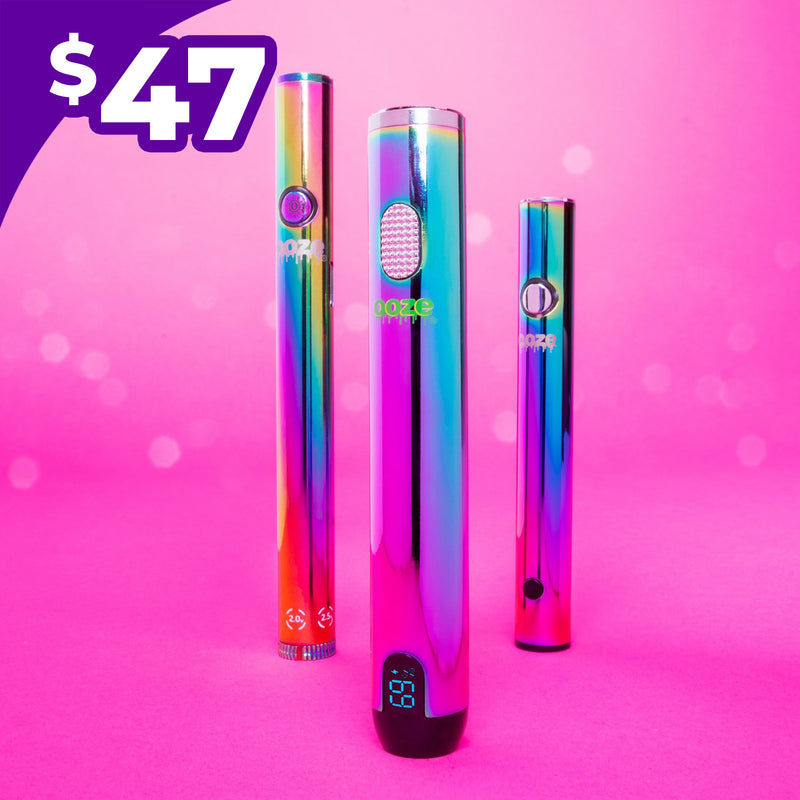 Three rainbow Ooze pens on a pink background with a price tag of $47.