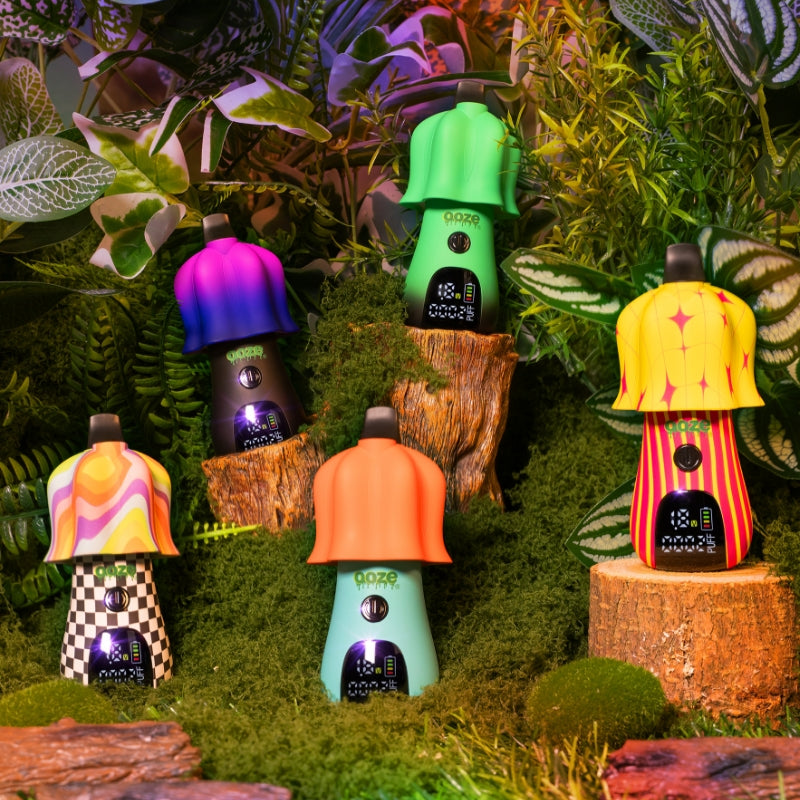 Five Ooze Shroom vape batteries are displayed in a woodland scene