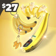 Gold Banana-shaped electronic device with keychain on a yellow background