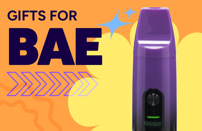 Gifts for BAE promo graphic showing a purple Ooze Booster extract vape on a yellow and orange background
