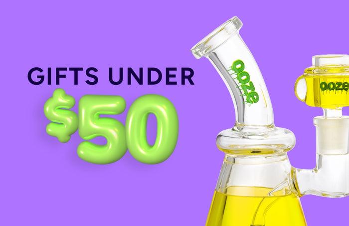 Gifts Under $50 with a yellow glyco bong on a purple background