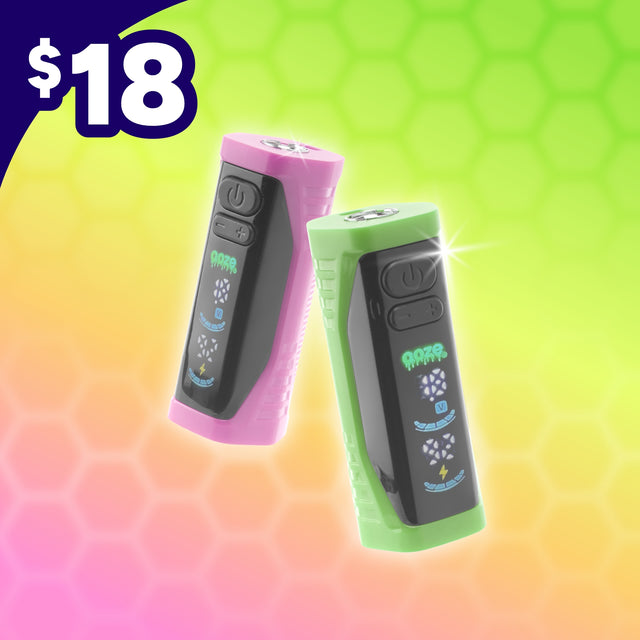 Two Ooze Runt vape devices shown on a bright gradient background with a $18 price badge. One device is pink and the other is green, both with black sides and blue graphic details.