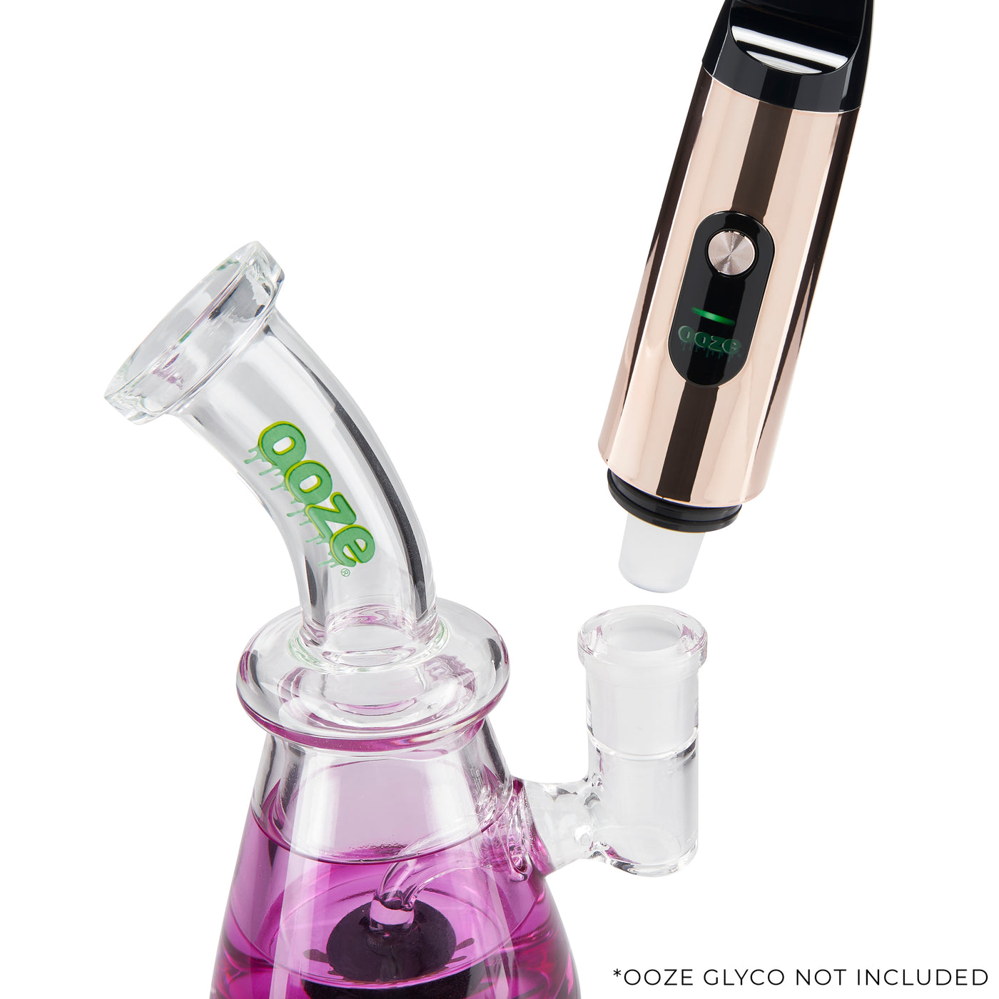 Rose Gold Booster extract vape being attached to ooze dab rig