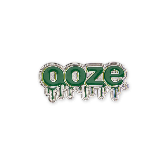 The Ooze logo enamel pin is facing straight on.