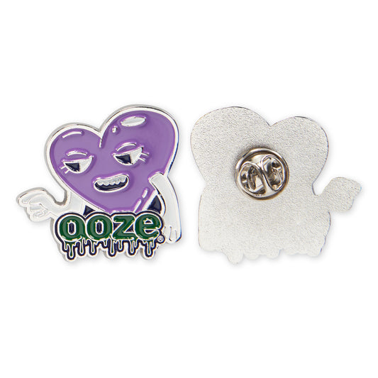The front and back of the Ooze Chroma Heart enamel pin. The front is colorful and the back is chrome with a metal backing