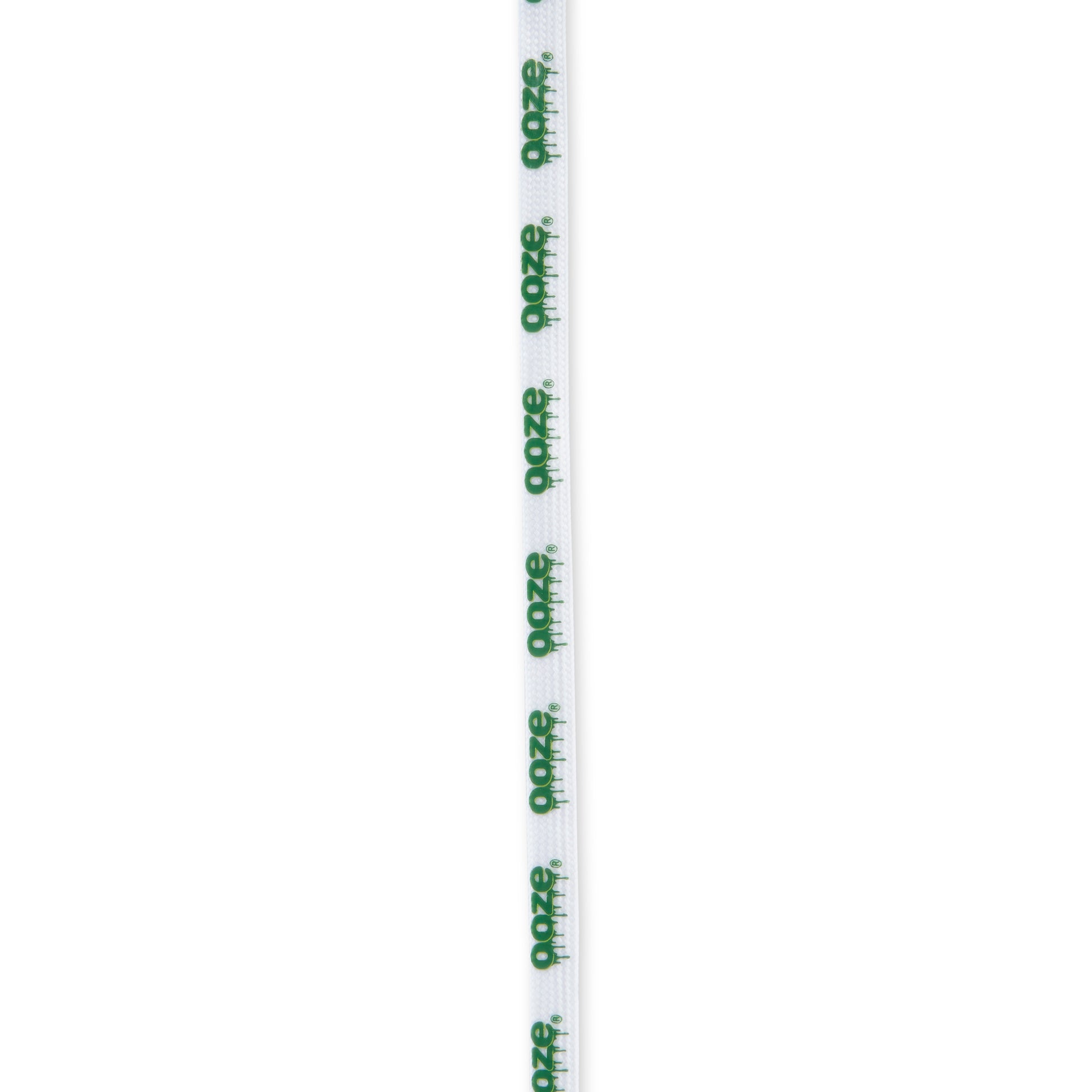 A white Ooze shoelace is stretched out against a white background.