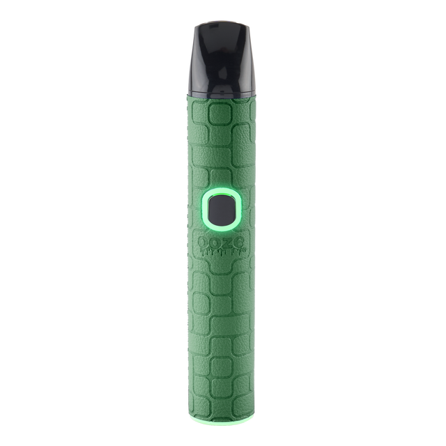 A green textured Pinch dry herb vape pen with the light turned on