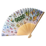 Angled view of the Ooze Hotel Lucky paper fan with light wood handle