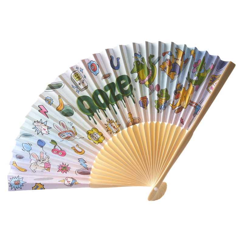 Angled view of the Ooze Hotel Lucky paper fan with light wood handle