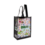 Small reusable tote bag with a colorful front design, Ooze logo, and black sides and handles