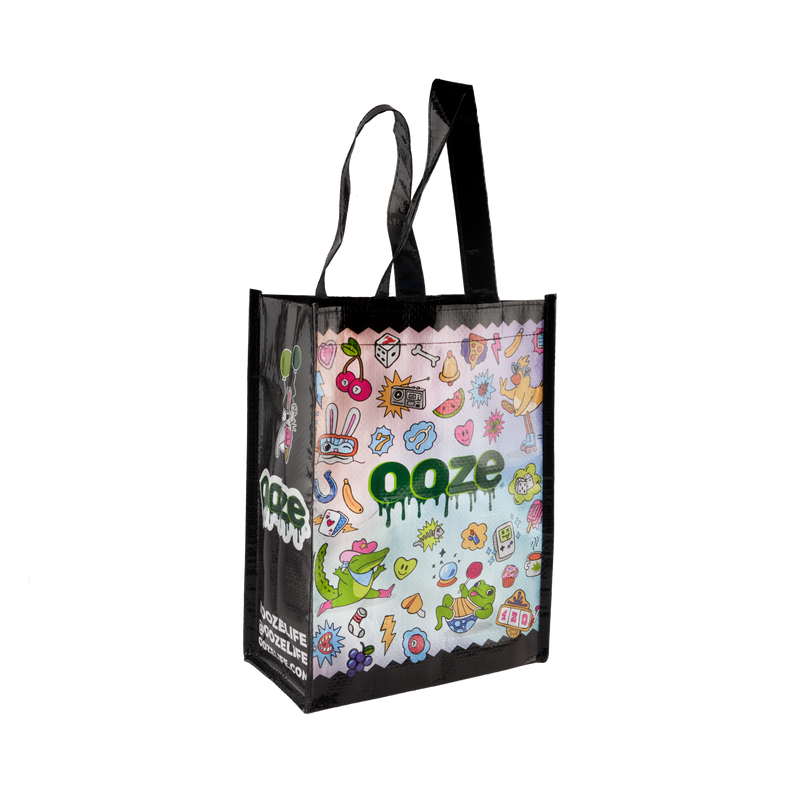 Small reusable tote bag with a colorful front design, Ooze logo, and black sides and handles