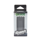 Front view of the black Ooze Runt Mini Battery in the box