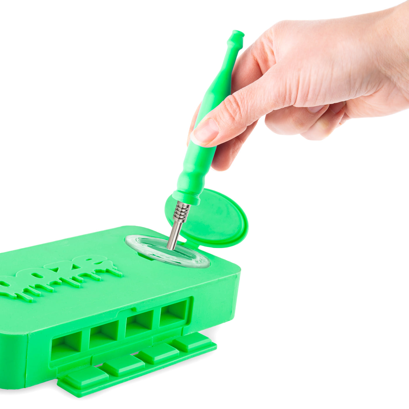 Hand using the nectar straw to take a dab from the green Ooze Slugger silicone dab dugout