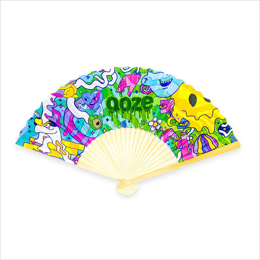 The limited edition Ooze Chroma paper fan is opened all the way to show the design