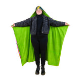 Wearing the Time Warp fuzzy hooded blanket with arms extended to show the green underside