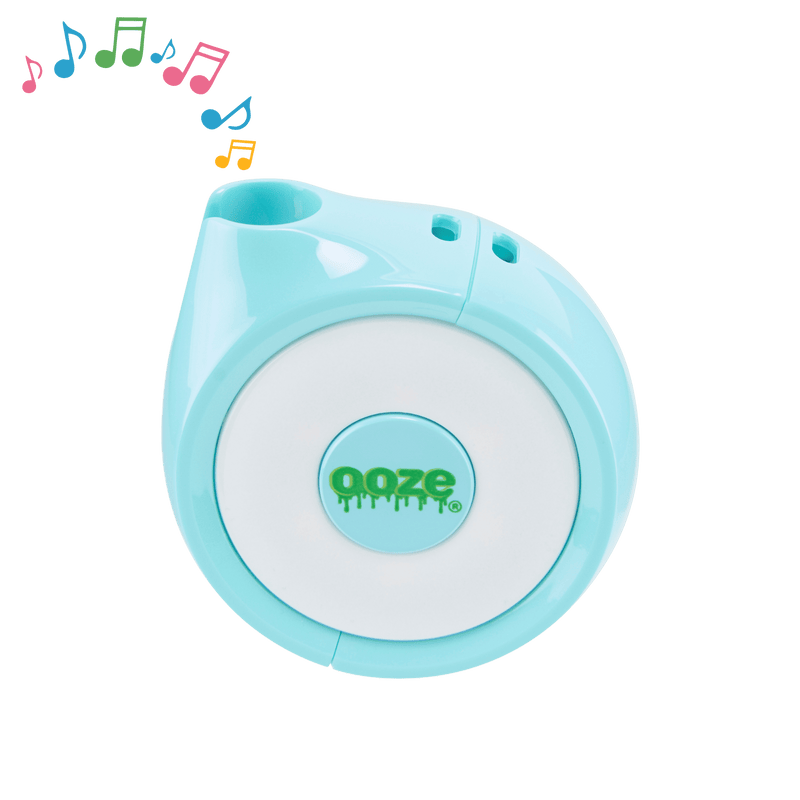 The aqua teal Ooze Movez speaker vape has colorful music notes playing