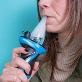 Taking a dab from a blue Trigger e-rig