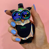 Glitch Ooze Hoot owl vape battery held in front of pink background