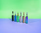 All 6 colors of the Ooze Novex are lined up, each has a 510 cartridge inserted
