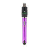The ultra purple Ooze Smart Battery is upright with the charger attached