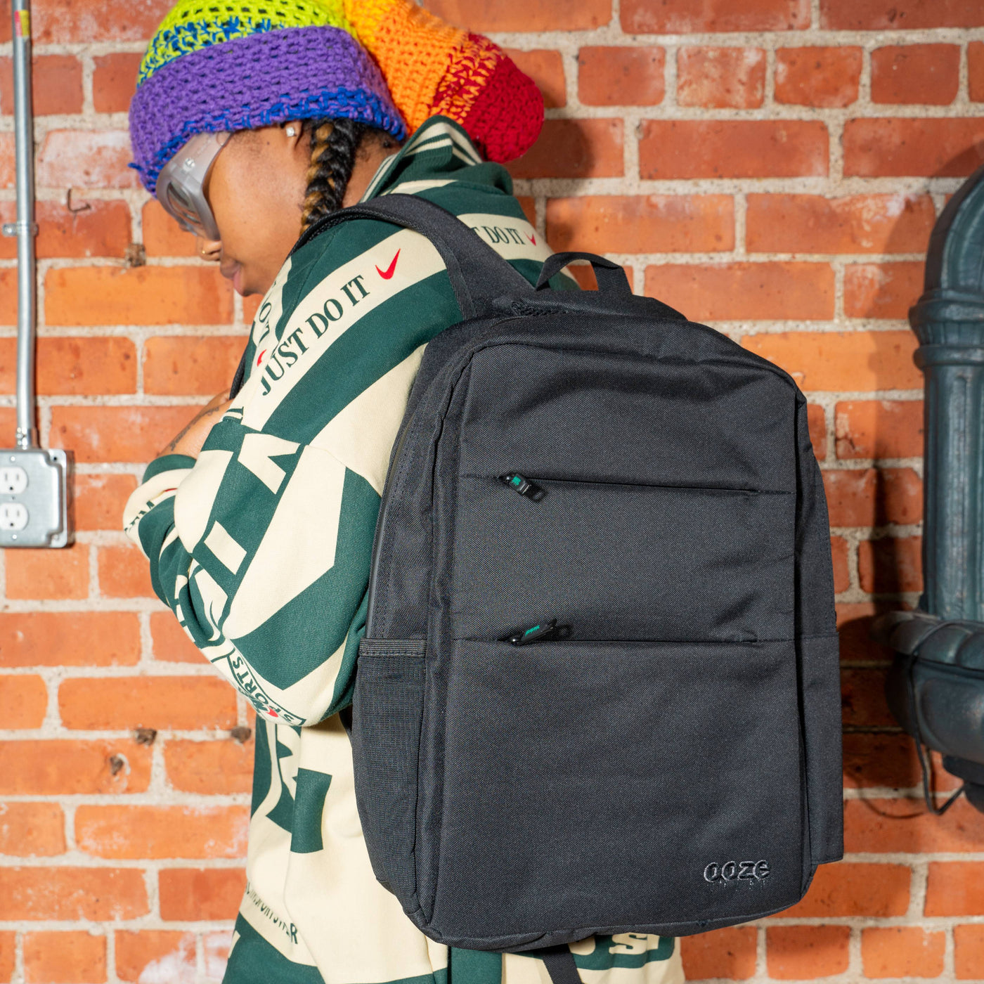 Wearing the black smell proof backpack