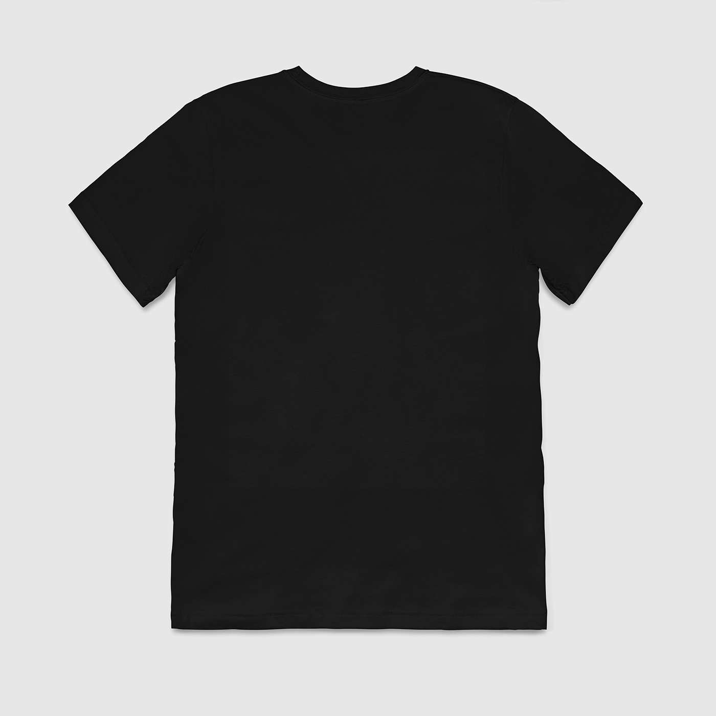 The back of the black Ooze Chroma t-shirt against a white background. It's a plain black shirt.