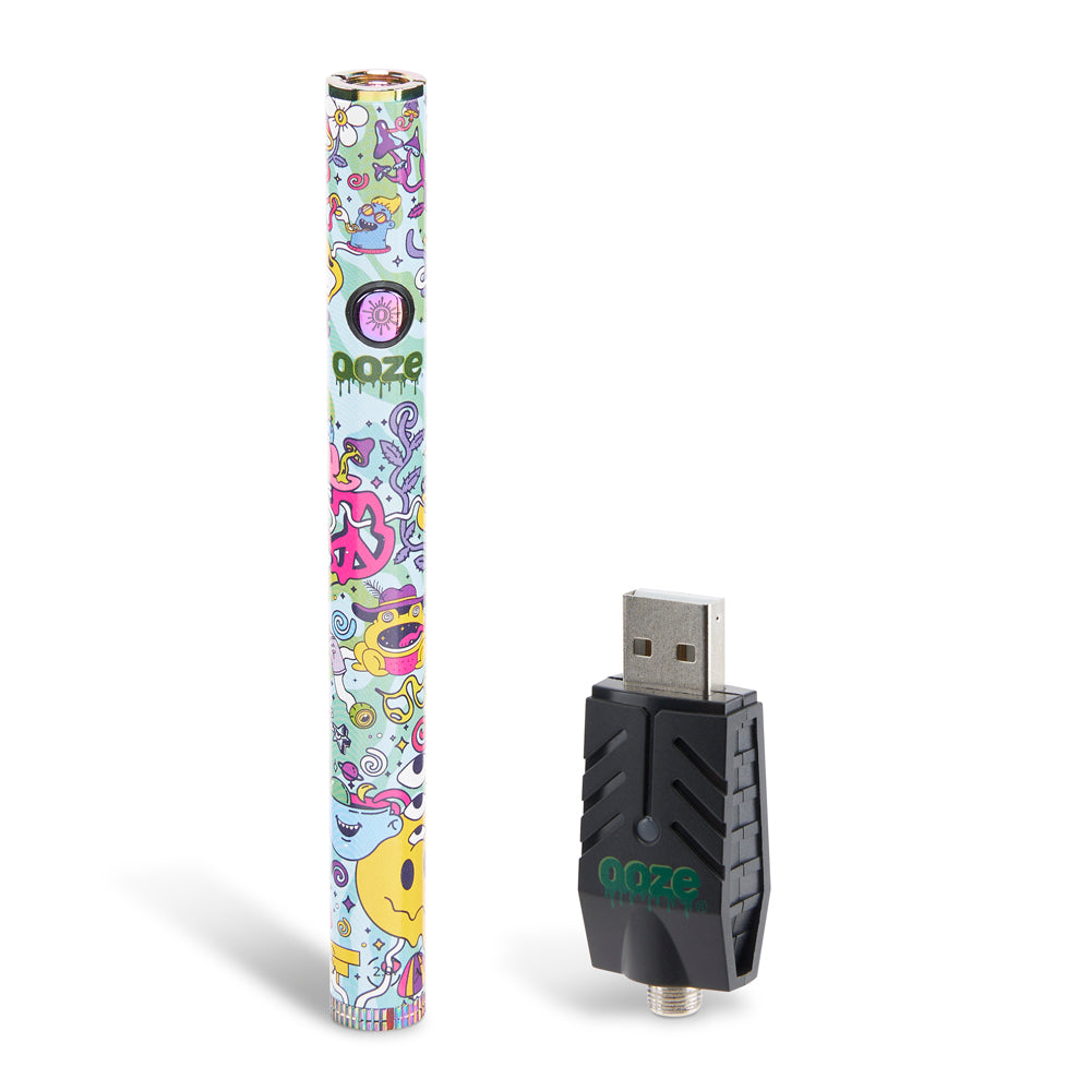 An Ooze Twist Slim Pen 2.0 in Chroma is next to the smart USB charger against a white background.