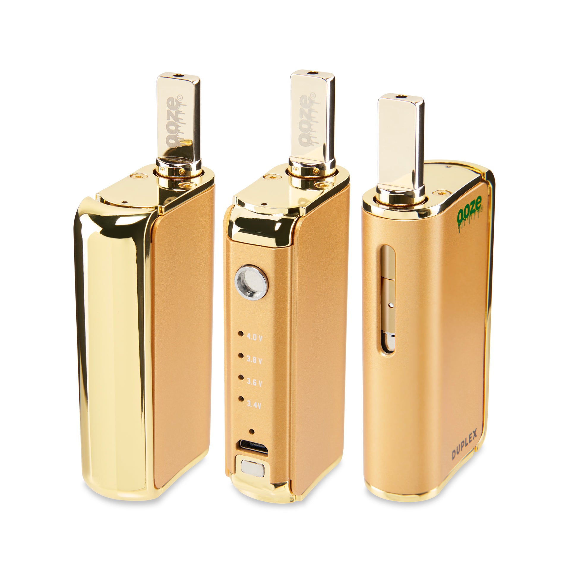 Three of The Lucky Gold Ooze Duplex Pro Vaporizers are in a line on an angle. The left has the magnetic button on, the middle has it off, and the left shows the opposite end of the device.