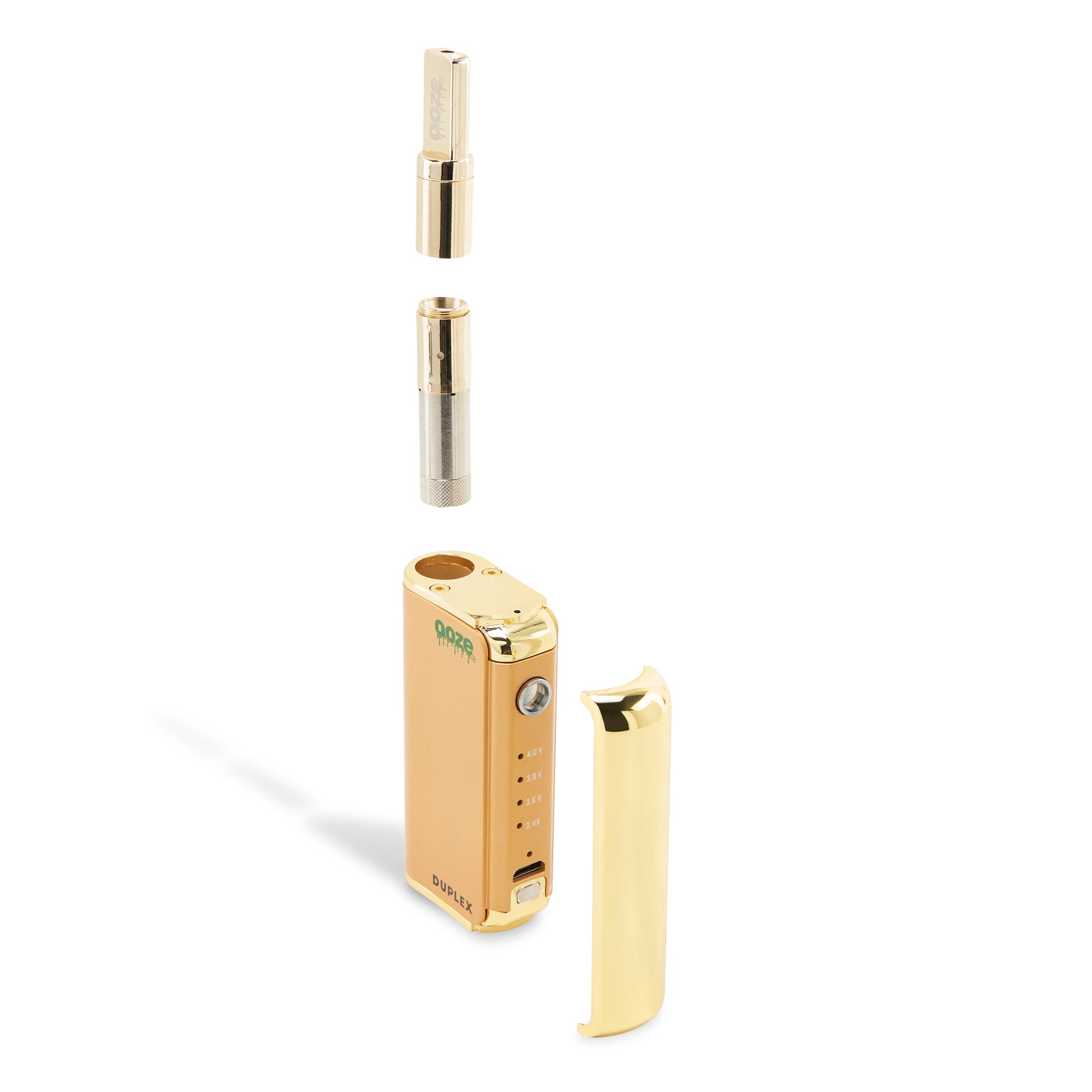 The Lucky Gold Ooze Duplex Pro Vaporizer is shown disassembled. The gold wax tank is attached to the adapter, unscrewed and floating above the device. The magnetic button is pulled in front of the device.