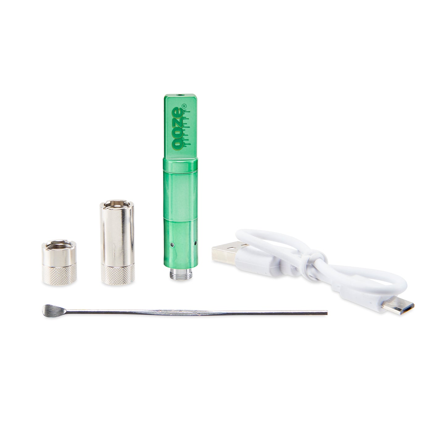 The Mary Jade Ooze Duplex Pro Vaporizer's accessories are grouped together. The 0.5g and 1ml magnetic adapters are next to the green wax atomizer, which is next to the white type-c charger. The dab tool is laying in front.