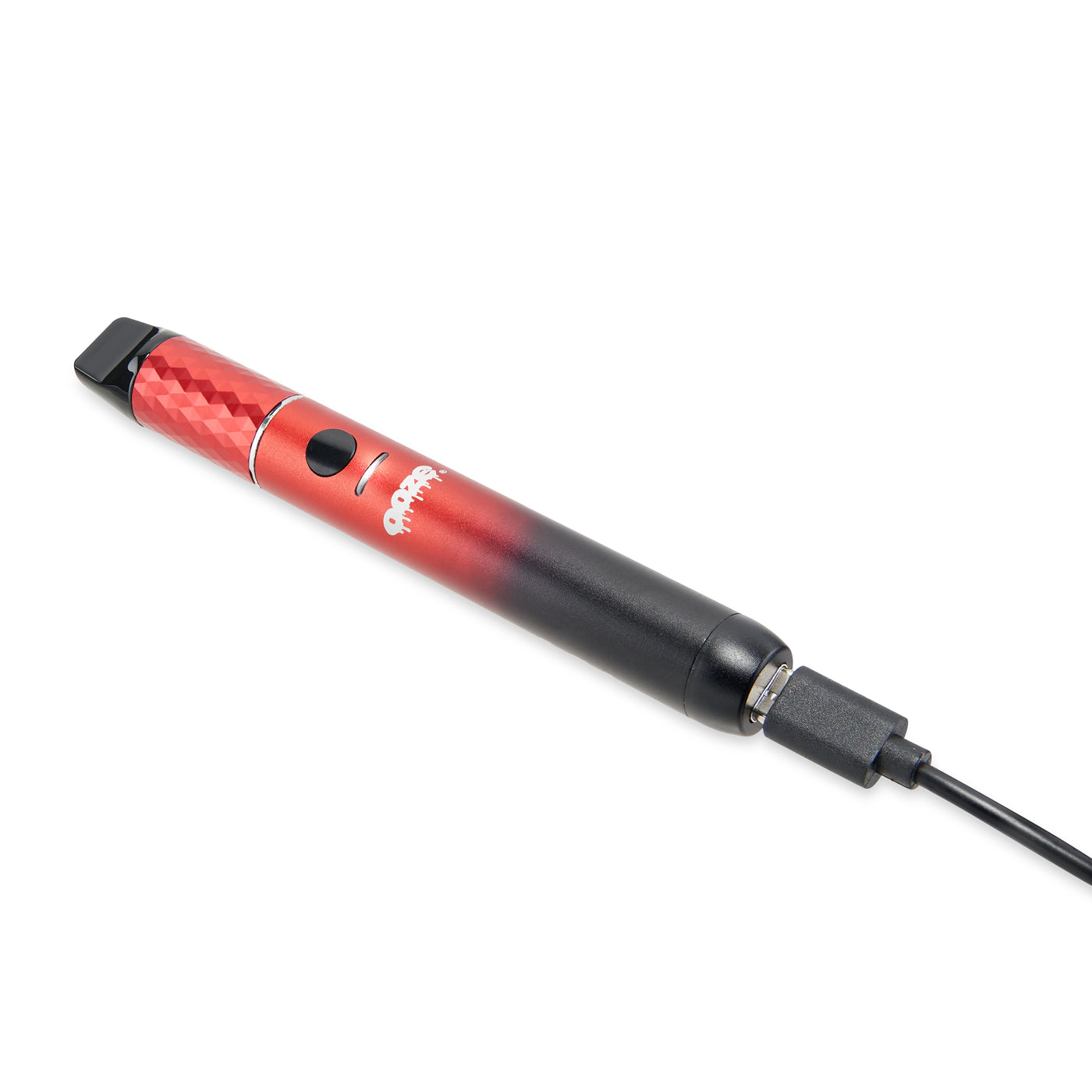 view of red and black Beacon dab pen being charged and lying down