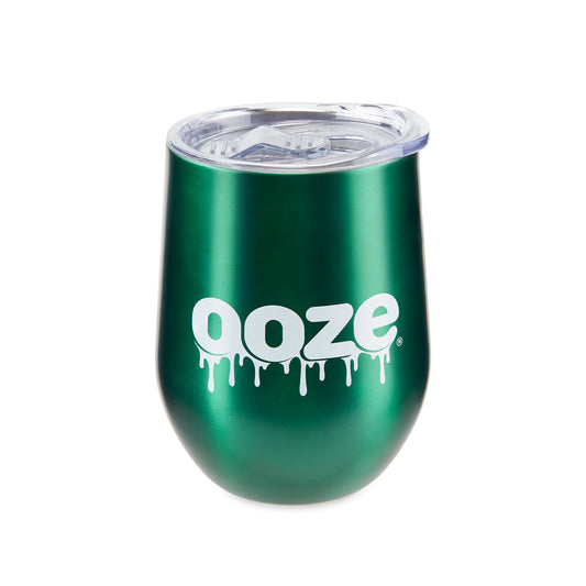The green Ooze Tumbler has a stemless wine glass design and the plastic lid is attached.