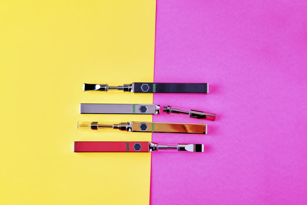 Different colors of Quad square vapes laying down