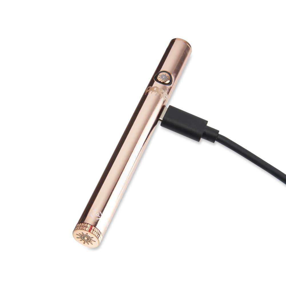 Rose Gold Twist Slim 2.0 Vape Pen Battery with 510 thread battery being charged