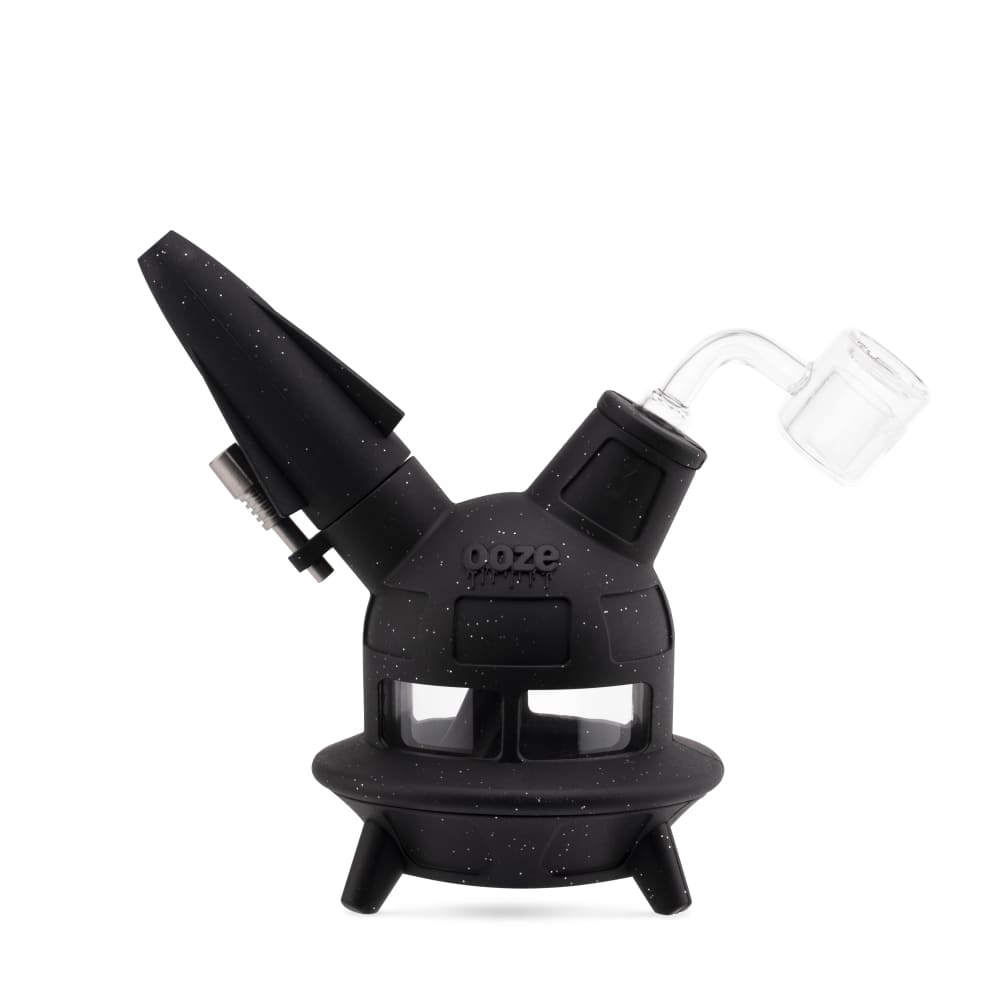 The shimmer black Ooze UFO is shown as a dab rig with the banger inserted