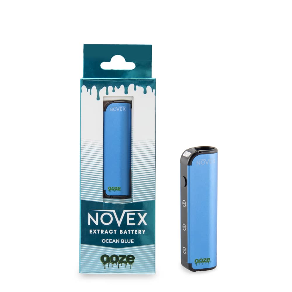 An ocean blue Ooze Novex stands at an angle, to the right of a blue Novex in a box
