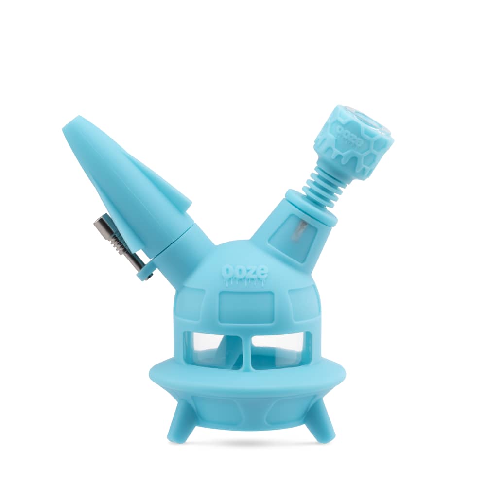 The aqua teal Ooze UFO is displayed as a bong with the armor bowl inserted