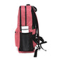 The side view of the coral red Ooze backpack with a white bottle in the side pocket